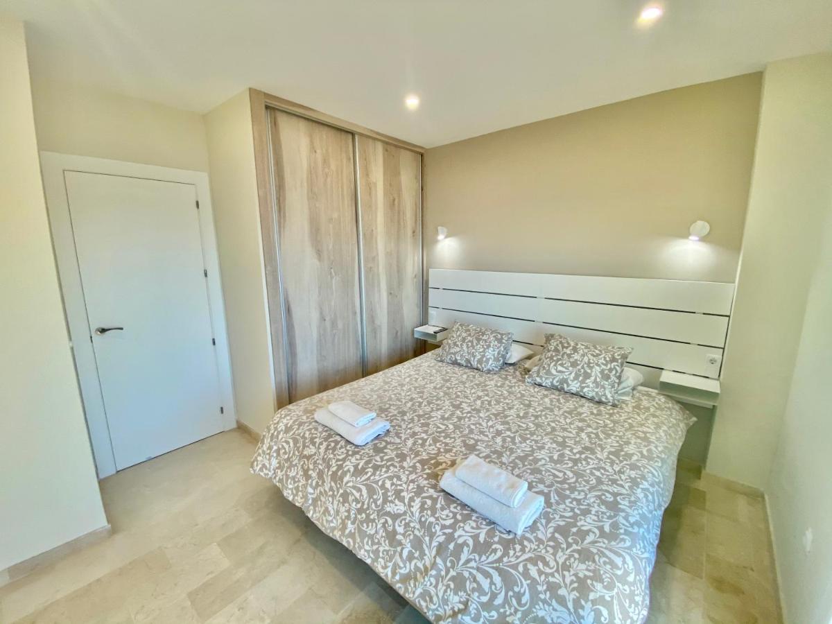 Apartamentos Turisticos Castillo Del Vigia 托雷莫利诺斯 外观 照片