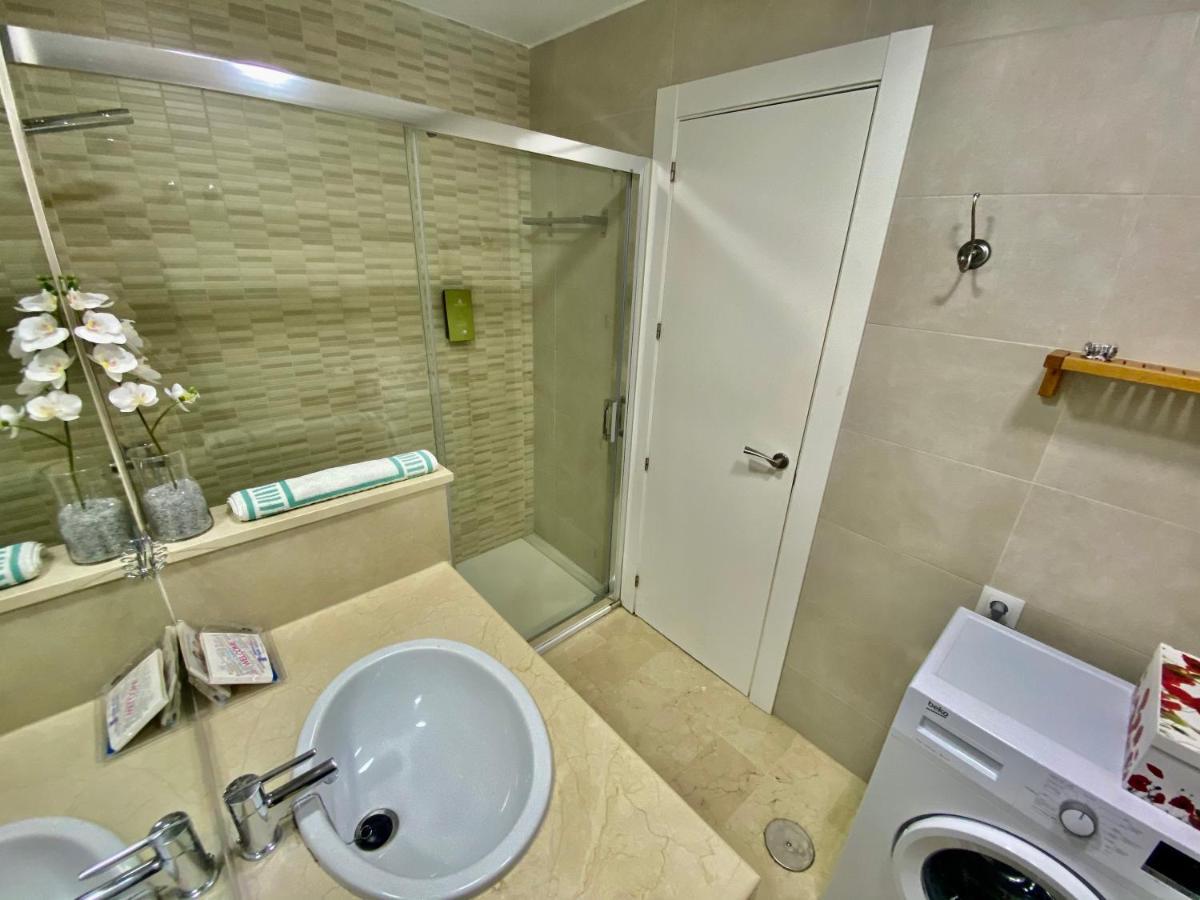 Apartamentos Turisticos Castillo Del Vigia 托雷莫利诺斯 外观 照片